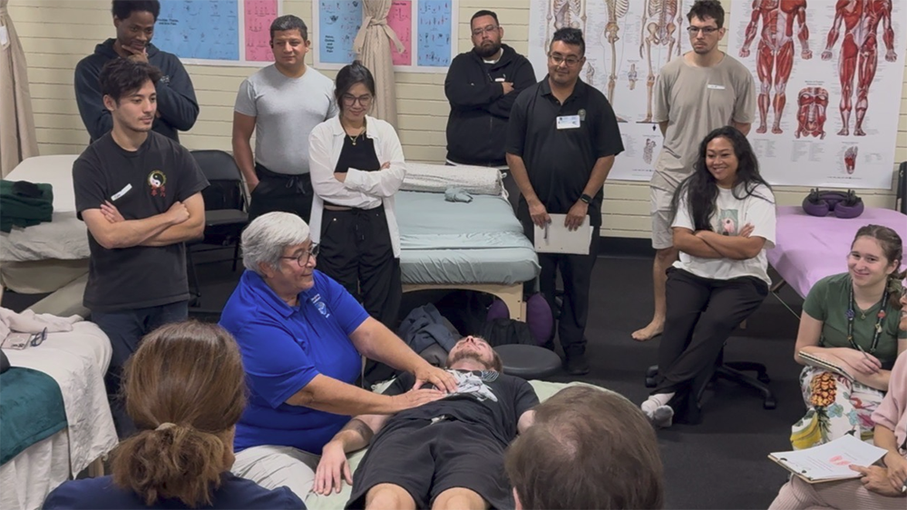 Cynthia Ribeiro Demonstrating Advanced Neuromuscular Therapy Techniques