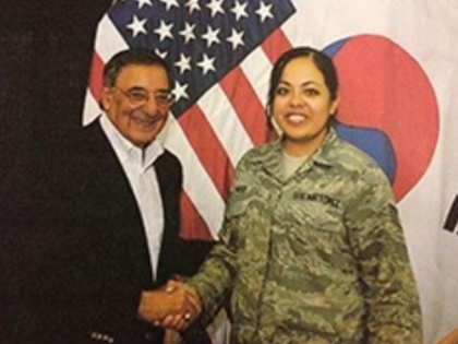 Edith Harris Receiving a Challenge Coin from Former Secretary of Defense Leon Panetta during his visit to South Korea in 2012